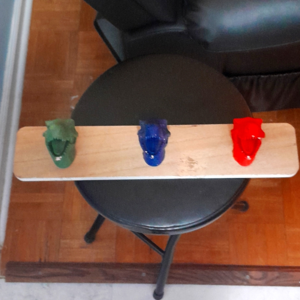 Dinosaur head bag hangers